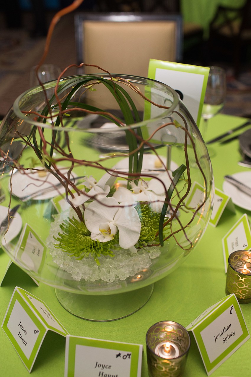The centerpieces were designed by Lee Younger at Pinaepple House 533.