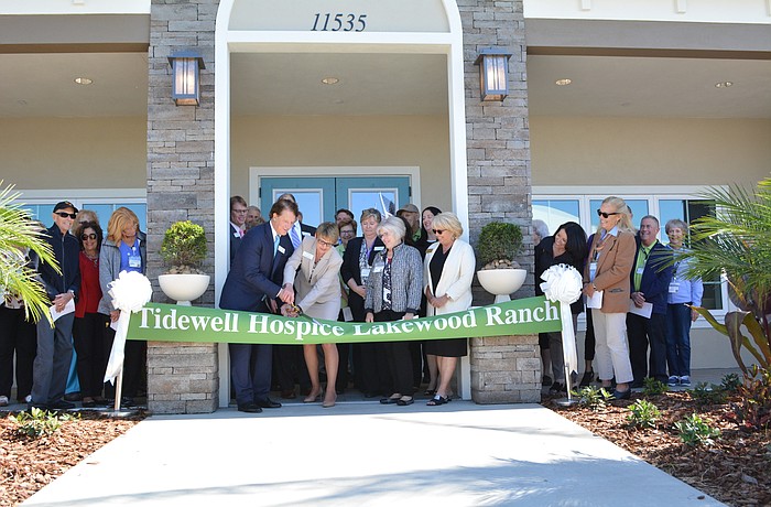 Tidewell Hospice officials cut the ceremonial ribbon to celebrate the opening of the Lakewood Ranch Hospice House March 9. It will begin receiving patients within one month, officials said.