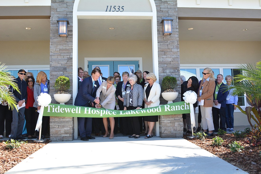 Tidewell Hospice officials cut the ceremonial ribbon to celebrate the opening of the Lakewood Ranch Hospice House March 9. It will begin receiving patients within one month, officials said.