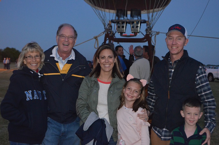 Nancy and Dave Clapp, Kelly, Kenley, Peter and Jack Crowley, all from Sarasota, enjoy the first Sarasota Balloon Festival in Lakewood Ranch.