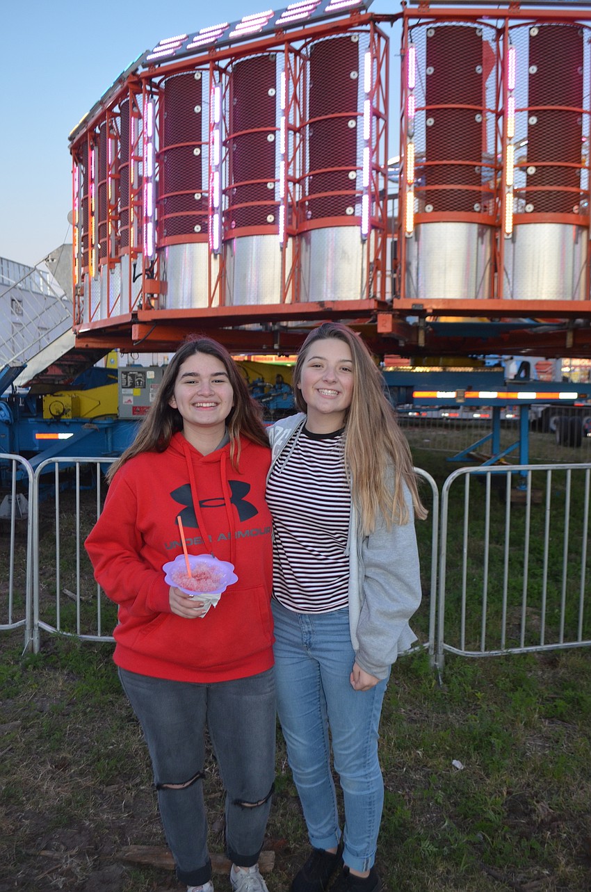 Emily Garcia and Jacqueline Bush of Bradenton check out the rides.