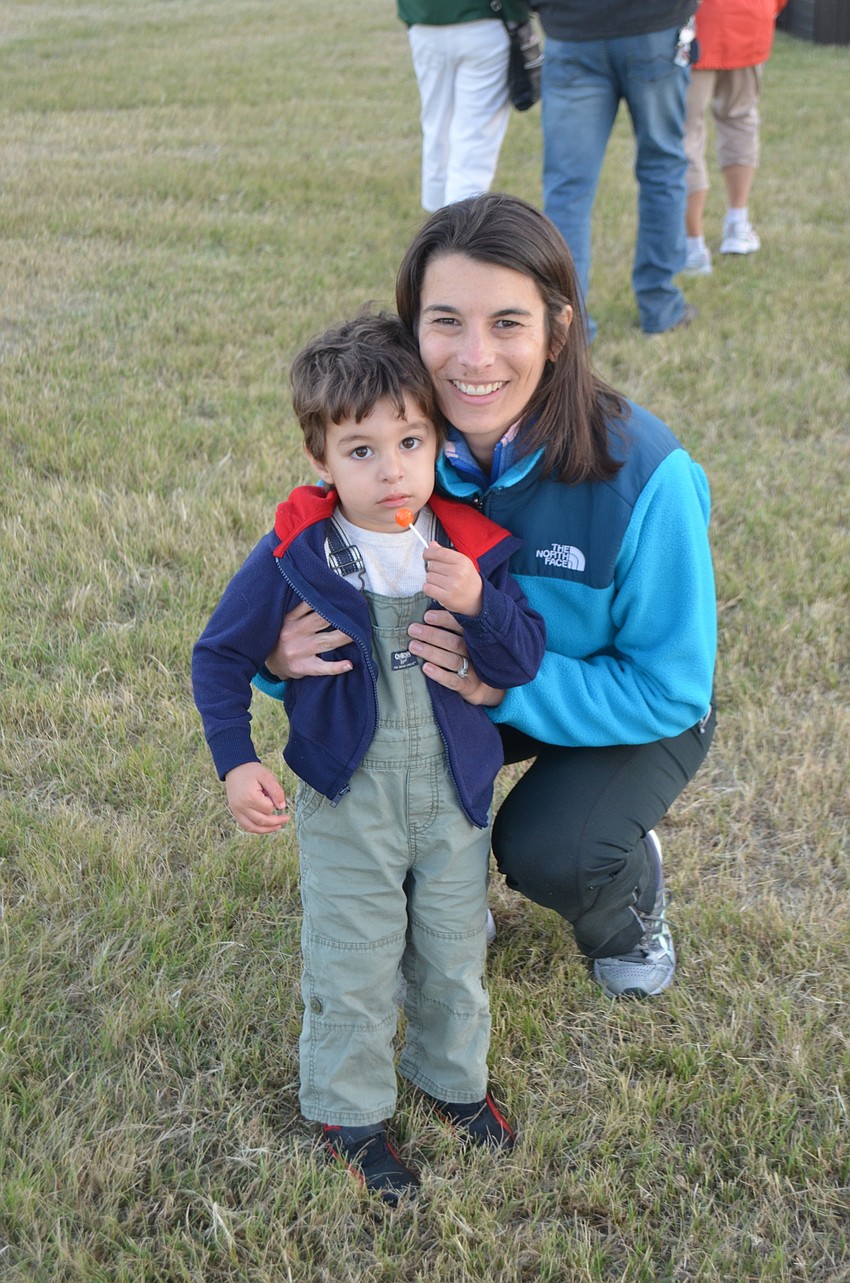 Greenbrook's Matteo and Caitlin Saviano watch as a hot air balloon takes flight.