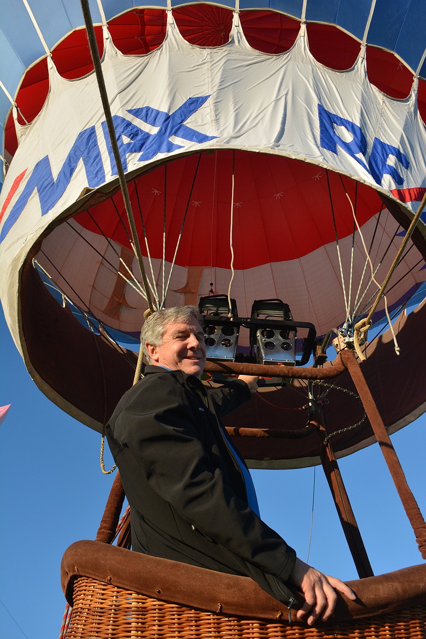 Pilot Fred Vereb of Tampa takes off in the RE/MAX hot air balloon.