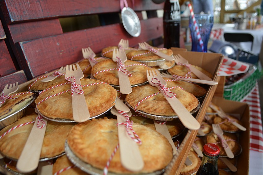 The VIP lunch included a spread of baked goods, including miniature apple pies.