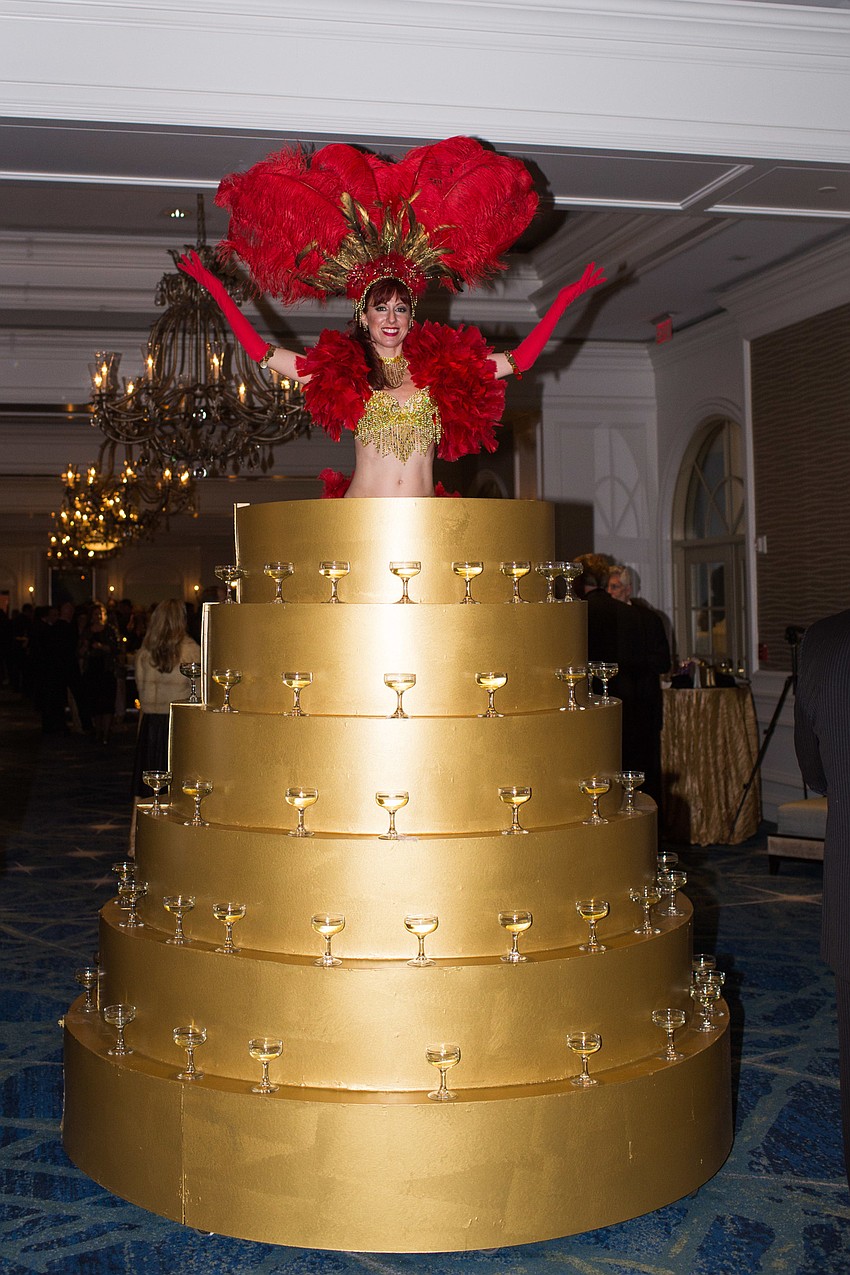 As guests walked in, they grabbed a drink from the tower.