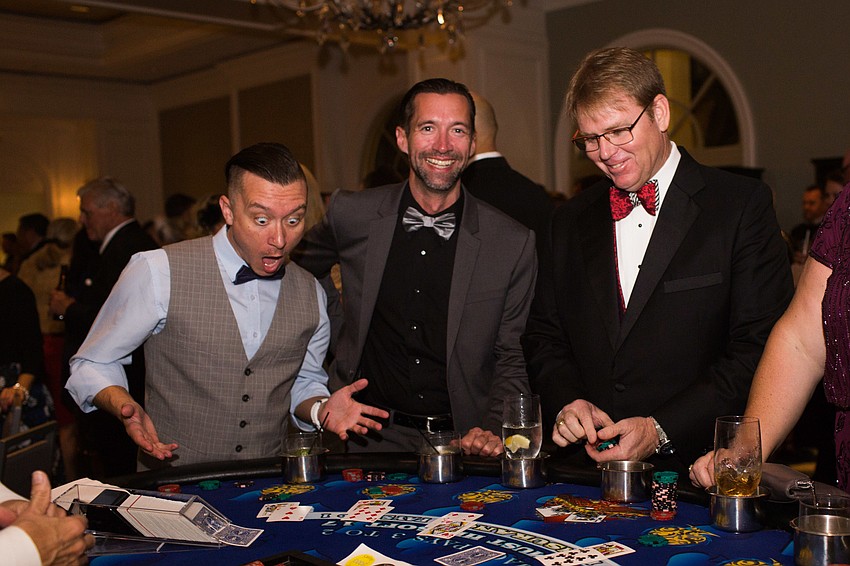 David Culver, Greg Wollaston and John LaCivita win big at blackjack.