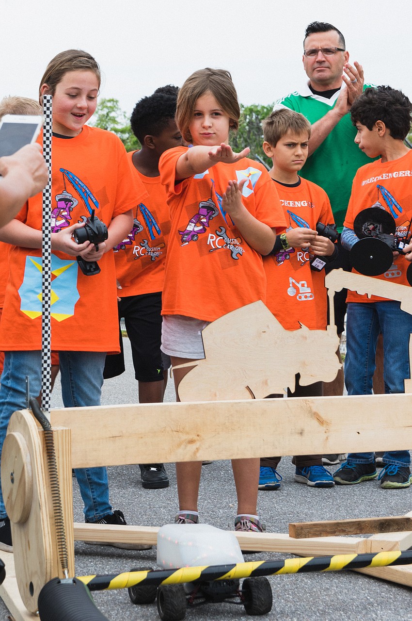 Lillia Checcone and Gia Vanna strategize right before the drag race.