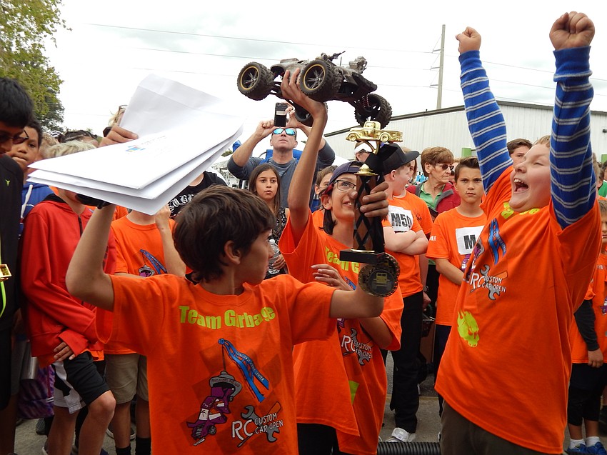 Team Garbage from The Mangrove School celebrate their first place victory in the lap race. Photo courtesy of Kati Burns.