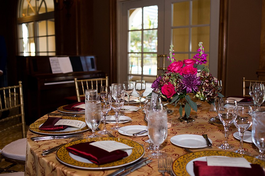 The room was elegantly decorated with gold lines and bright flowers.