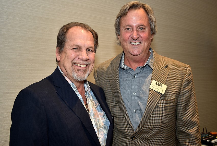 2018 Chamber Chairman Mark Meador and 2017 Chamber Chairman Mike Doll