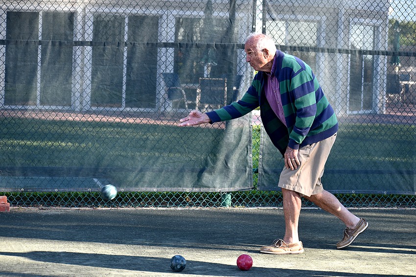 Ben Snyder points the ball toward the pallino.