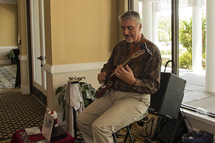 Guitarist Joel Rodney Siemion serenades the crowd.