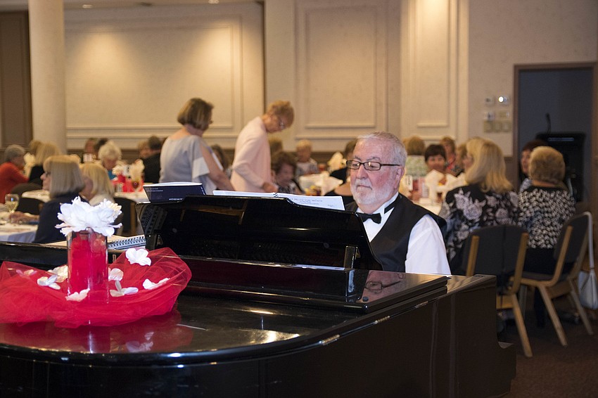 Pianist Nick Franco provides music for the crowd.
