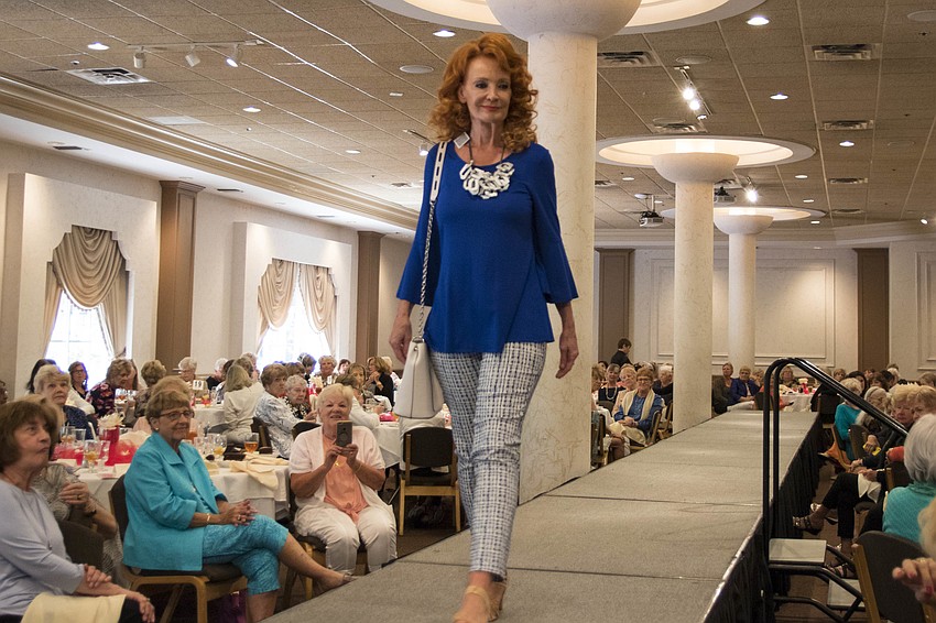 Debra Magliolo struts her stuff on the catwalk.