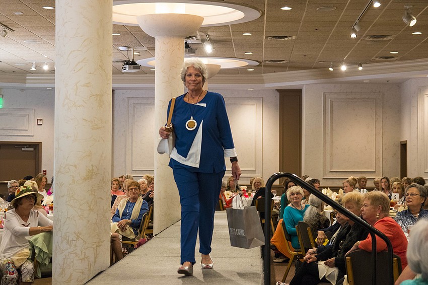 Ann Durkin wears a two-piece suit from Evelyn and Arthur.