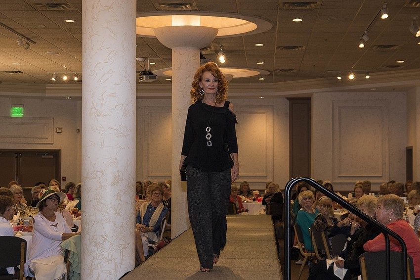 Debra Magliolo models an evening look from Evelyn and Arthur.