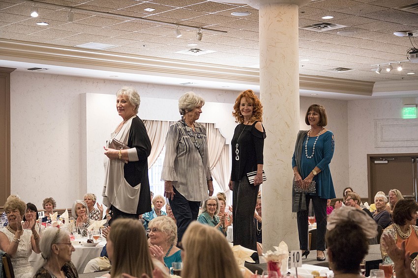 Models walk for the finale.