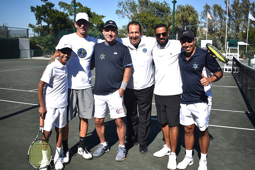 Athletes Orel Adga and Daniel Dudockin, event host Larry Greenspon, ITC Vice President of Development Yoni Yair, coach Badea Karkabi and Noam Yitzhaki