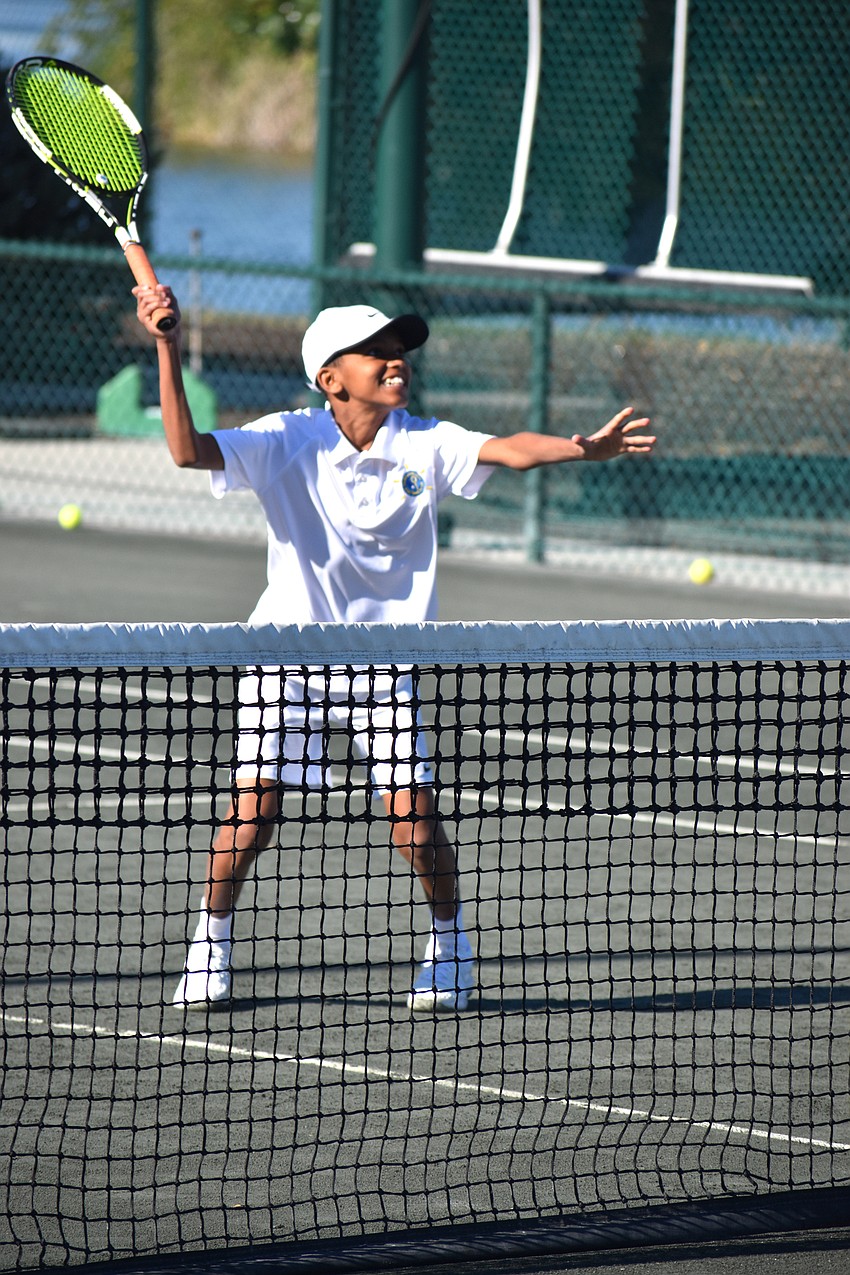 Orel Adga plays with a smile on his face during the exhibition.