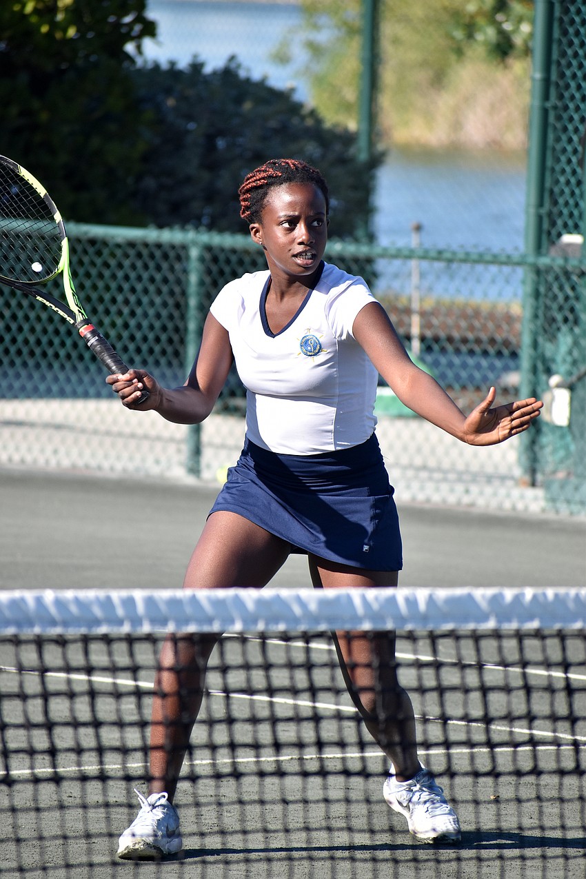 Jennifer Ibeto participates in a rally drill during the exhibition.