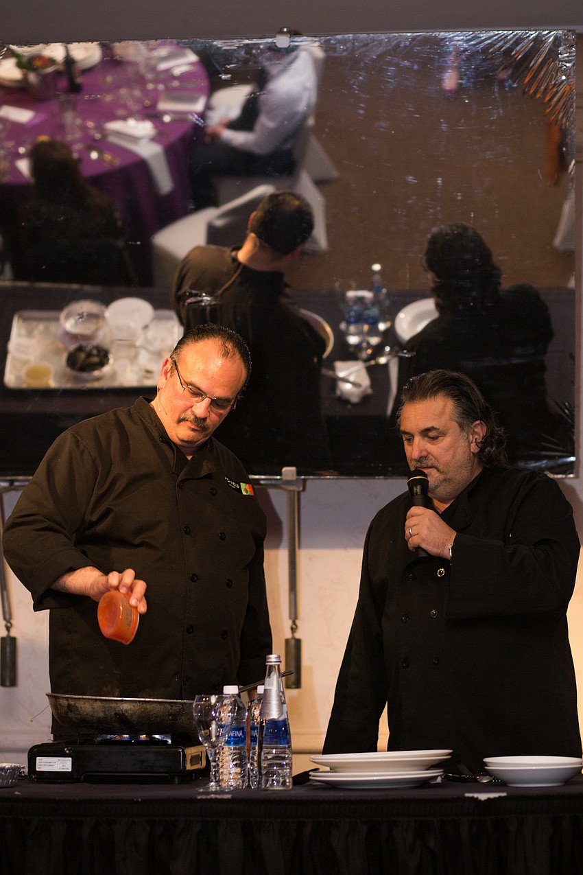 Michael's On East Co-Proprietor Phil Mancini and Michael's On East Chef Jamil Pineda give their audience cooking directions.