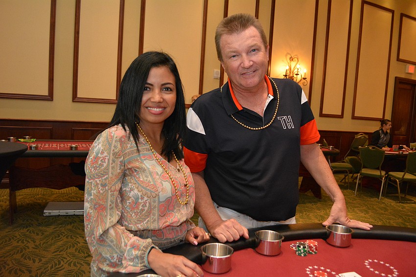 Proud Gecko parents Karen and John Cronen try their hands at Black Jack.