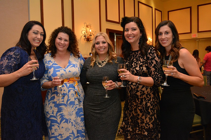 Dana Eddy, Bianca Lawrence, Denise West, Melissa Summerlee and Liz Johnson enjoy the evening together.