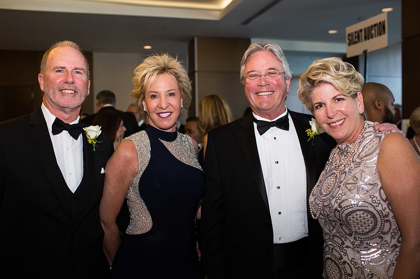 Tim and Diane Muldon with Michael and Coral Pleas