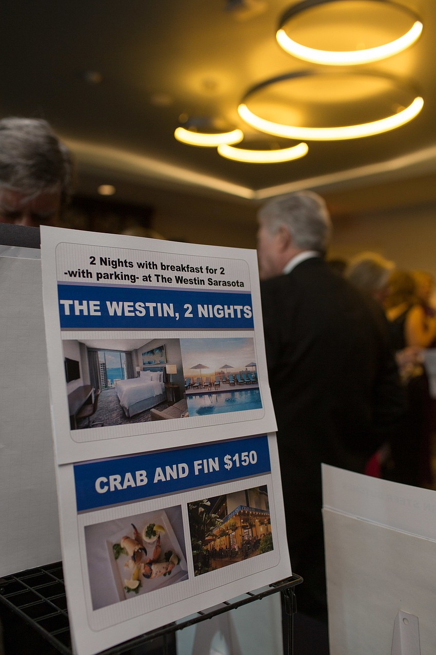 Five silent auction items were available for bidding during cocktail hour.