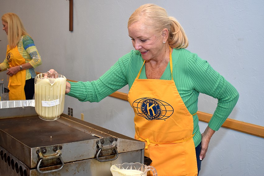 Phyllis Black gets ready to make another batch of pancakes.