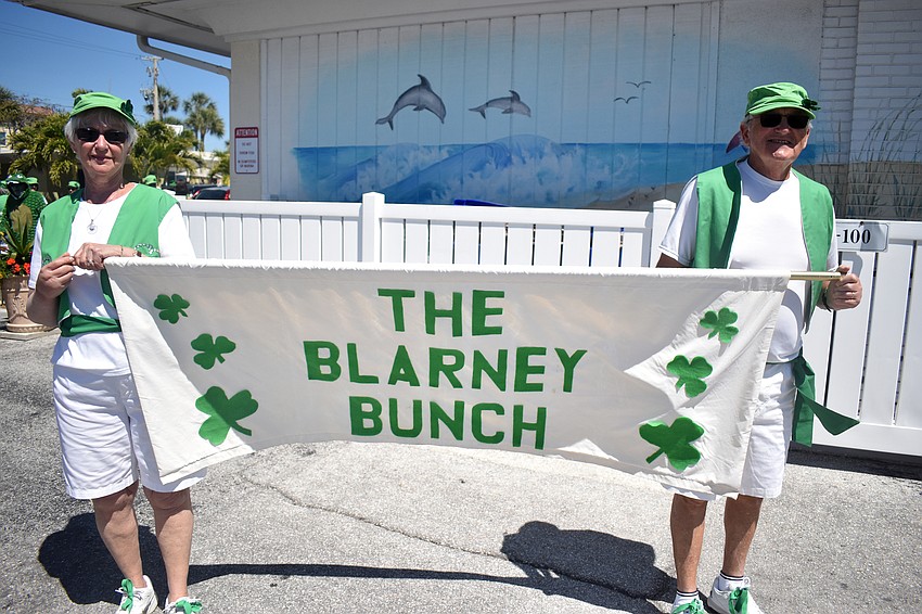 Cynthia and Stan Slader hold the banner for The Blarney Brunch.