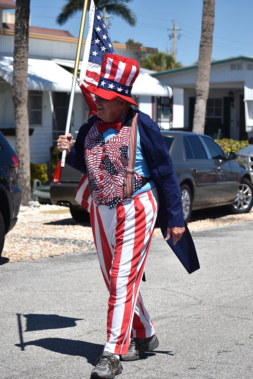 Uncle Sam smiles at the crowd as he walks the parade route.