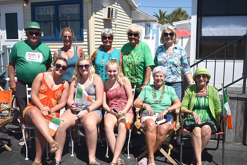 Twin Shores and Gulfshore residents and their families line the streets to watch the parade.