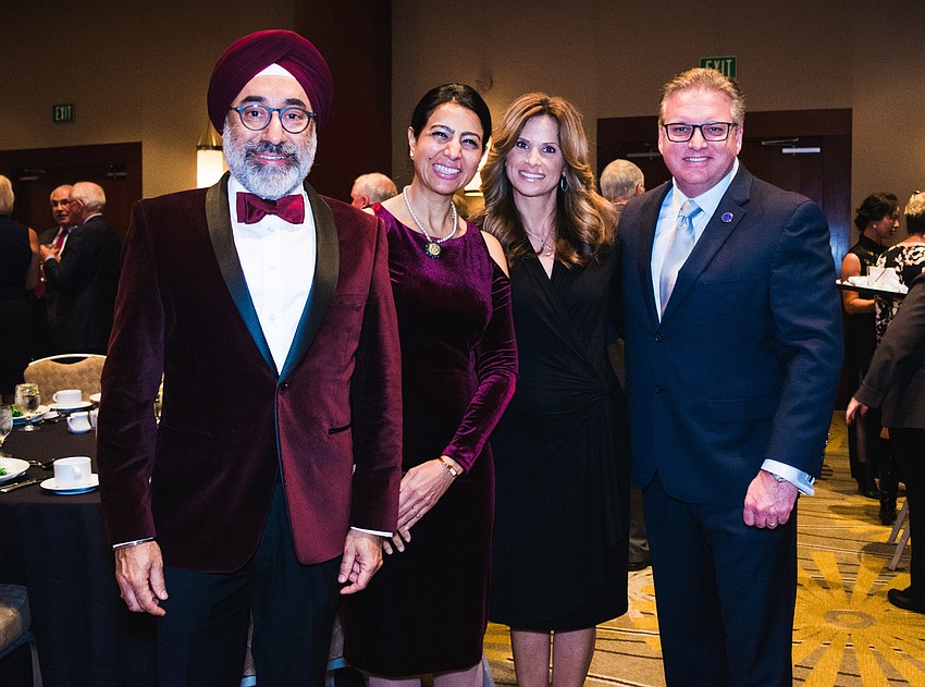Royce International President Harry Anand, Ritu Anand, Lori Moran and Sarasota County Commissioner Mike Moran