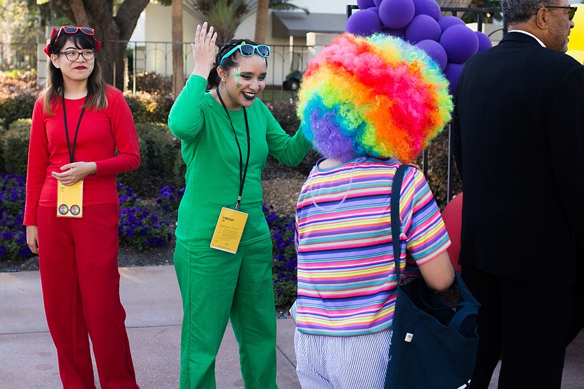 Lindsey Lim greets guests as they walk in.