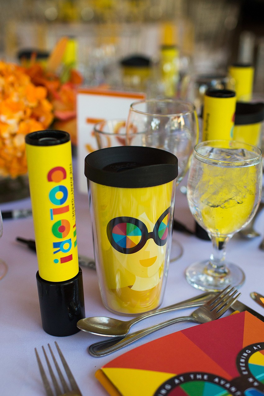 Guests were given a kaleidoscope, pair of glasses and a cup at their seat.