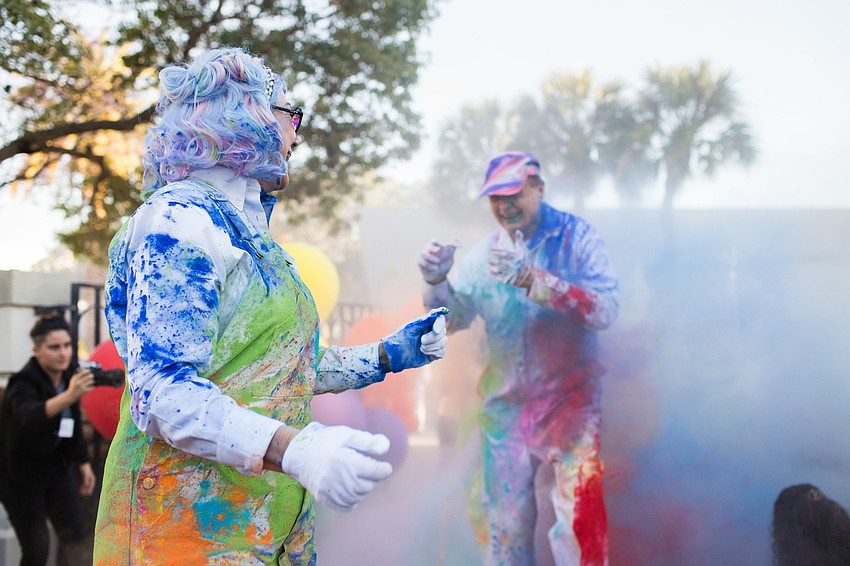 Ringling College President Larry Thompson follows behind Pat.