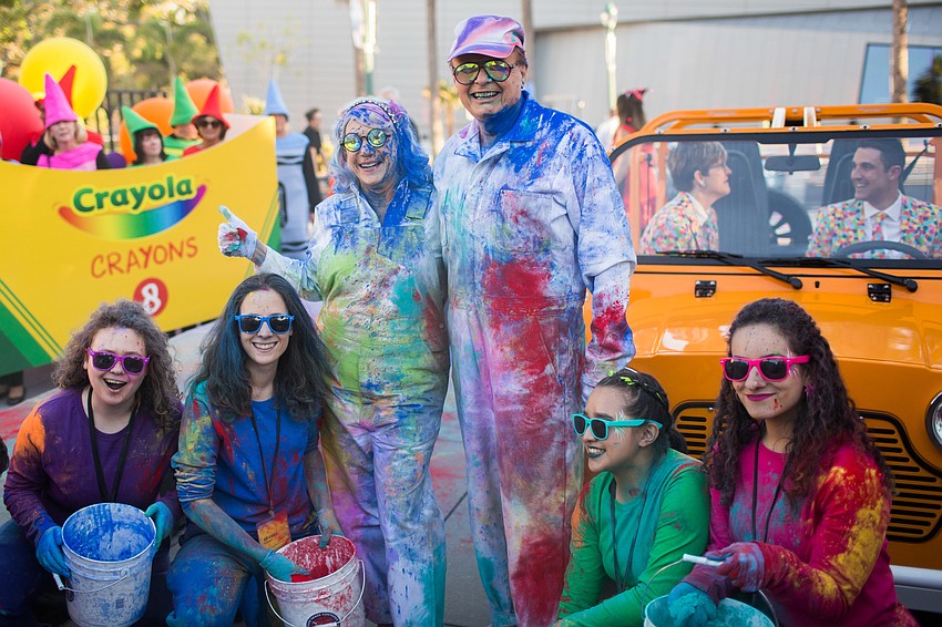 Ringling students pose with Pat and Ringling College President Larry Thompson.