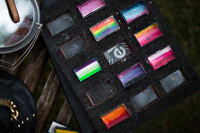 Suzy Kalin brought an array of colors for her face painting.