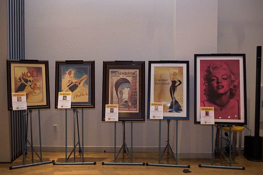 Artwork in the silent auction lined the side wall of the hall.