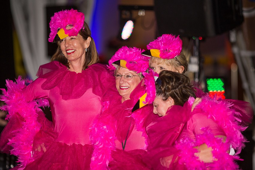 The flamingos pose for a photo after winning best group.