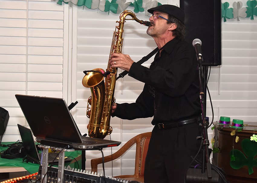 DJ Saxman performs during dinner.