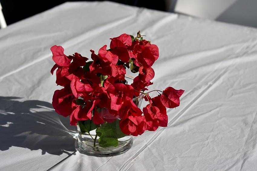 Pink flowers decorated each table.