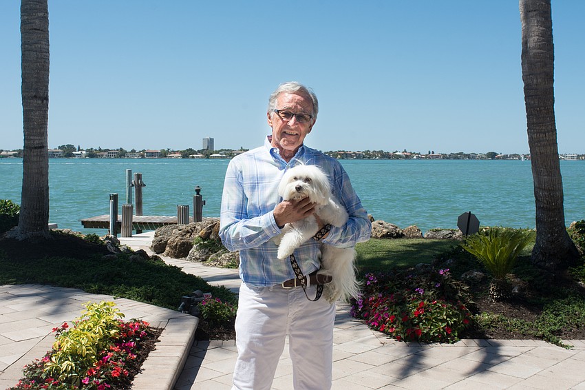 Garden owner Joe Angeleri with his dog Shelby
