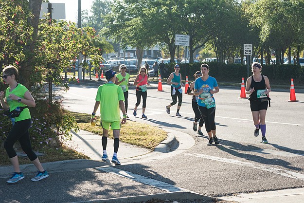 Runners reach the final mile of the course.