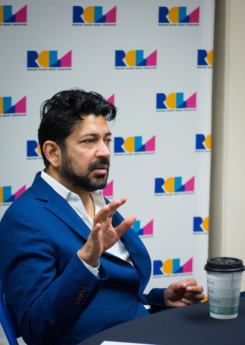 Siddhartha Mukherjee answers questions backstage.