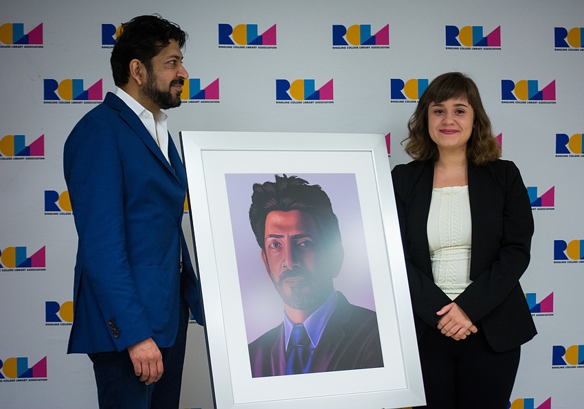 Ringling College of Art and Design student  Yekaterina Kaydash presents Siddhartha Mukherjee with a portrait she made using compiled images she found of him on Google.