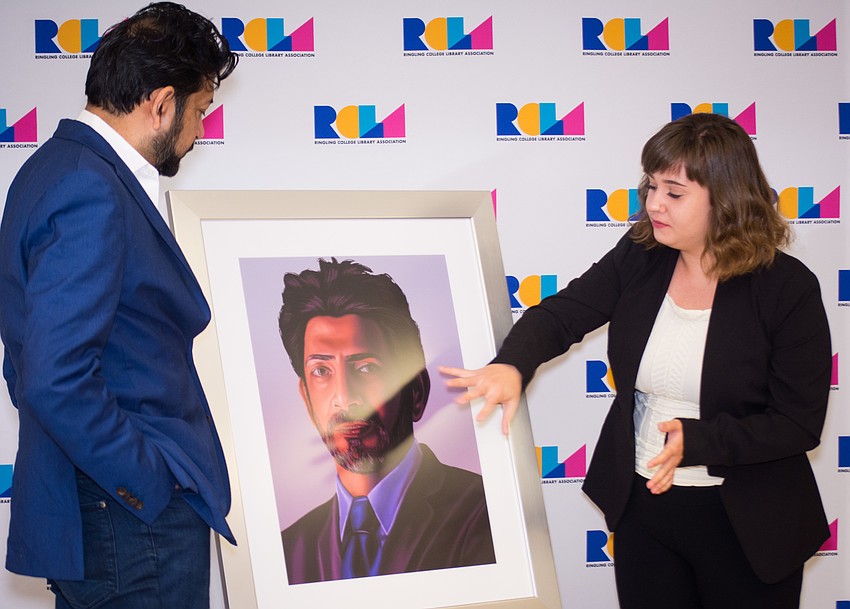 Ringling College of Art and Design student  Yekaterina Kaydash explains to Siddhartha Mukherjee the process behind creating his portrait.