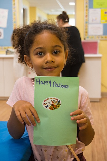 Alexandra Jefferson shows off her Passover greeting card.