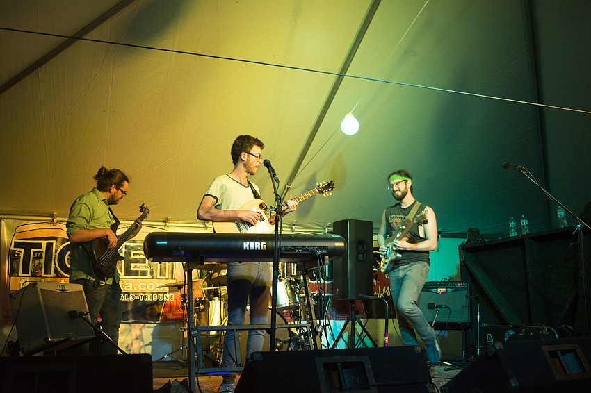 Local band Physical Plant plays their original tunes.